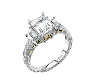 Coast Diamond Platinum Emerald Cut Diamond Flanked By Trapezoids With Engraved Diamond Shank