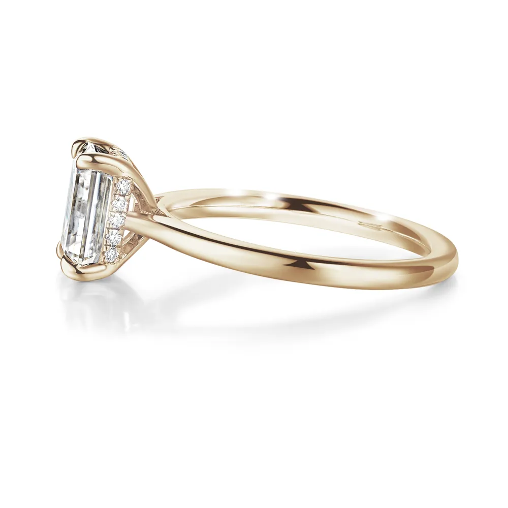 Solitaire Emerald Cut Engagement Ring With Hidden Halo