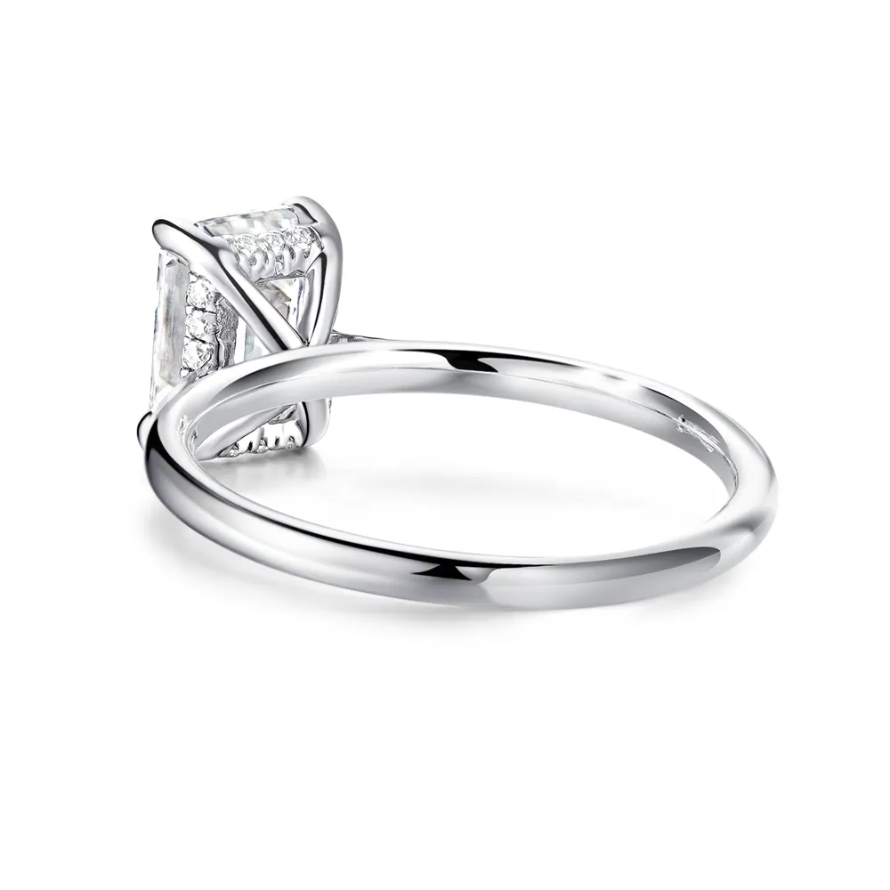 Solitaire Emerald Cut Engagement Ring With Hidden Halo